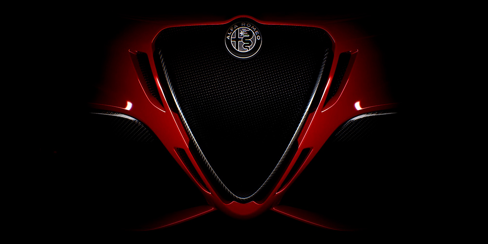 Alfa Romeo in Red, close-up of grille and badge.